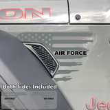 Gray tattered American flag decal sticker with black Air Force text installed on a Jeep Wrangler or Gladiator fender vent.