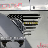 Black tattered American flag decal sticker with gold Air Force text installed on a Jeep Wrangler or Gladiator fender vent.