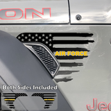 Black tattered American flag decal sticker with yellow Air Force text installed on a Jeep Wrangler or Gladiator fender vent.