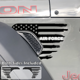 Black tattered American flag decal sticker with white Air Force text installed on a Jeep Wrangler or Gladiator fender vent.