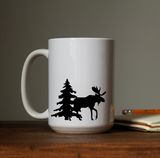 Bull moose with antlers in forest with tree waterproof vinyl decal sticker on a coffee cup.