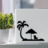 Palm tree umbrella and chair at beach waterproof vinyl decal sticker on a laptop tablet computer.