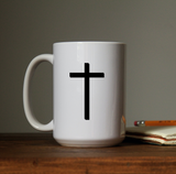 Cross Waterproof Vinyl Decal Sticker on a coffee cup.