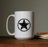 Distressed worn tattered allied military invasion star waterproof vinyl decal sticker on a coffee cup.