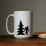 Sasquatch bigfoot yeti in forest with tree waterproof vinyl decal sticker on a coffee cup.