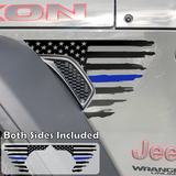 Black tattered, torn and weathered American flag with a blue middle line decal sticker, filling in the side fender vent area on a jeep wrangler.