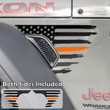 Black tattered, torn and weathered American flag with a orange middle line decal sticker, filling in the side fender vent area on a jeep wrangler.