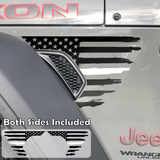 Black tattered, torn and weathered American flag with a white middle line decal sticker, filling in the side fender vent area on a jeep wrangler.