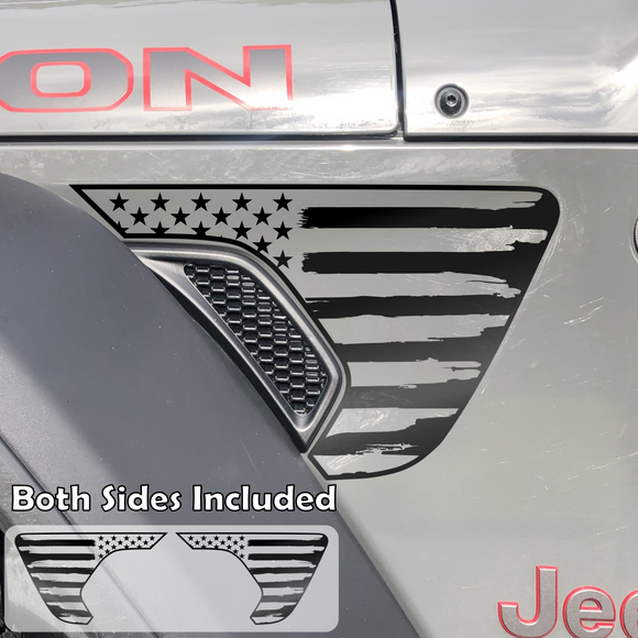 Black tattered, torn and weathered American flag decal sticker with outline, filling in the side fender vent area on a jeep wrangler.